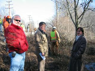 Police Chief Ed Parsons and Township Engineers check out the drainage problem at Boggs Ditch.