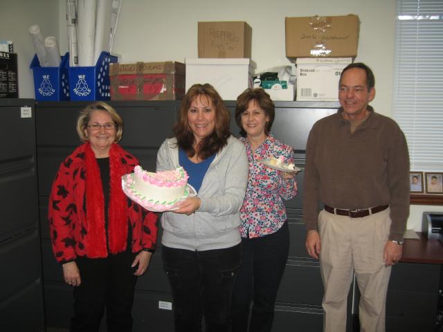 Township employees never miss an opportunity to eat cake!