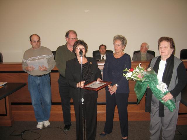The Township Committee honored Jackie DiCarlo (fourth from left) on March 3rd with a resolution expressing the township's sincere gratitude for Jackie's service to the community.