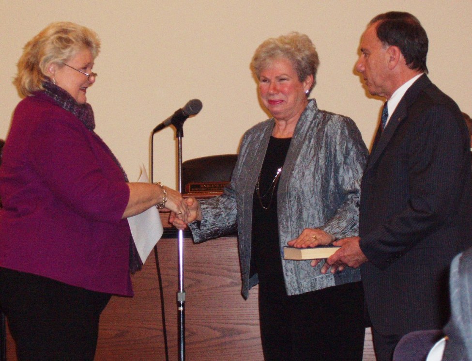 Senator Diane Allen swears in Marlene Jass as Mayor as her husband, Steven looks on